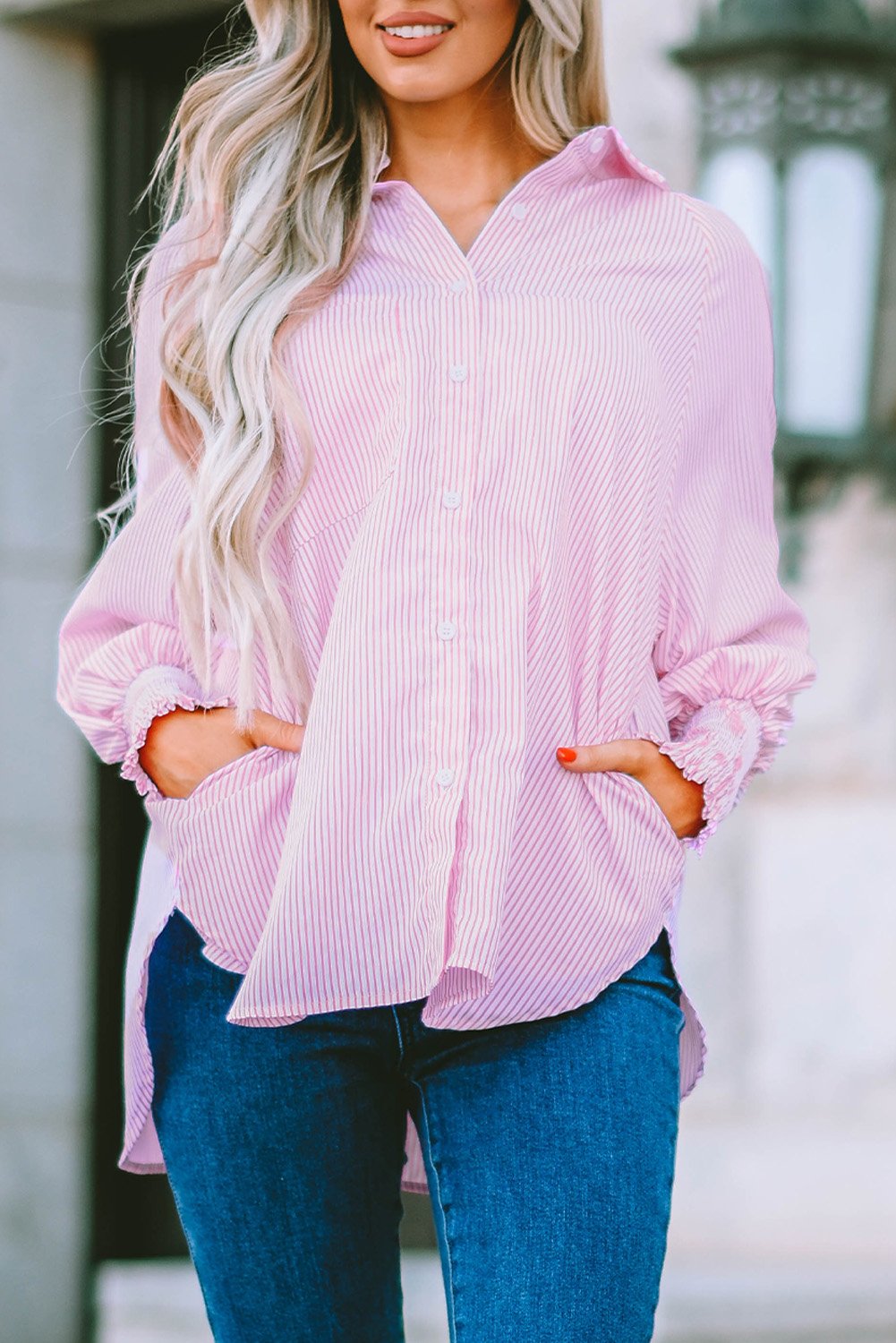 Mid-length smocked shirt with striped lapel and oversized drawdown sleeves